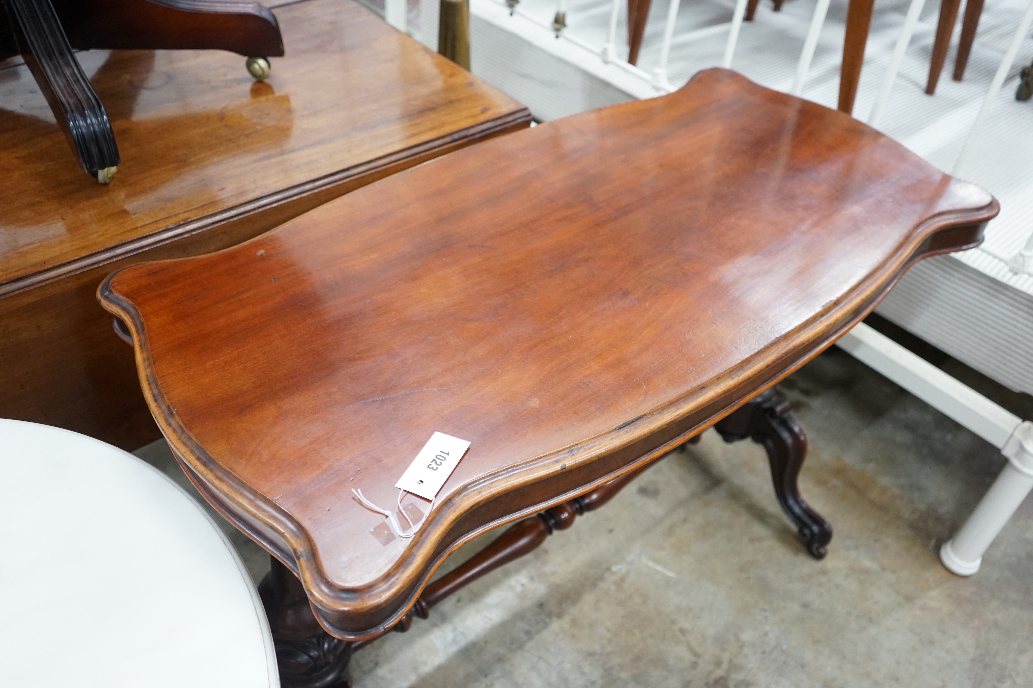 A Victorian mahogany stretcher table, length 106cm, depth 52cm, height 75cm